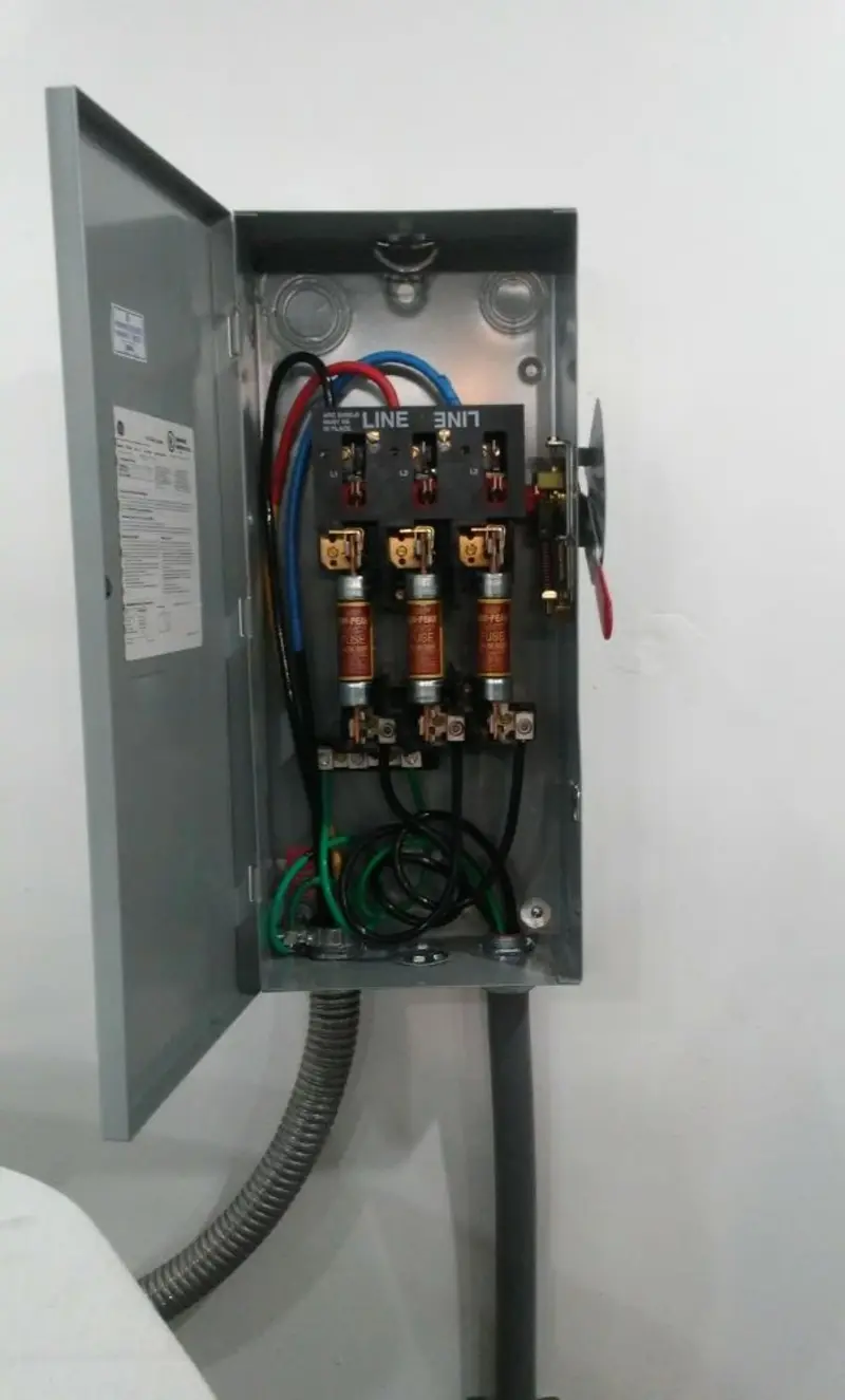 Three-phase disconnect switch installed for Smoke Detector Installation in Owasco